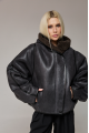 Short sheepskin coat with a hood made of natural sheepskin in graphite color